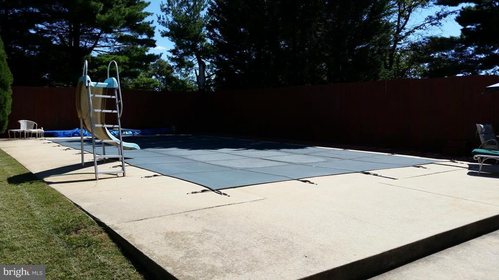 5372 Renn Road Frederick, MD 21703 - Photo 7 of 9 a swimming pool with lounge chair