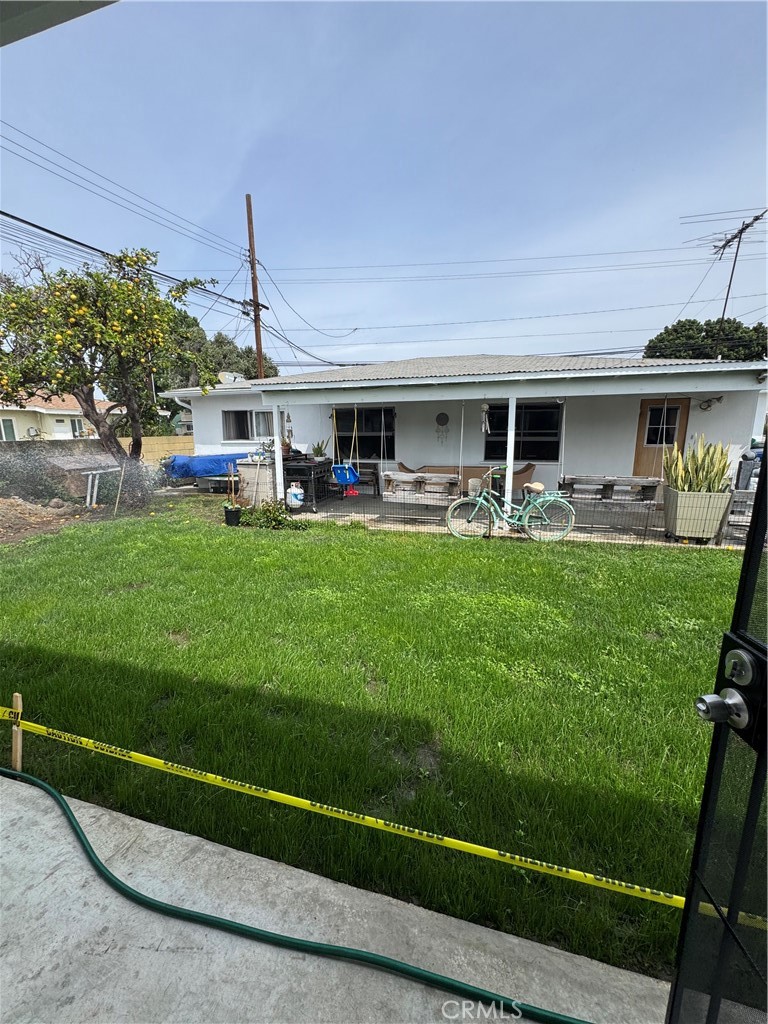 8418 Stewart And Gray Road Downey, CA 90241 - Photo 15 of 17 a house view with a sitting space and garden