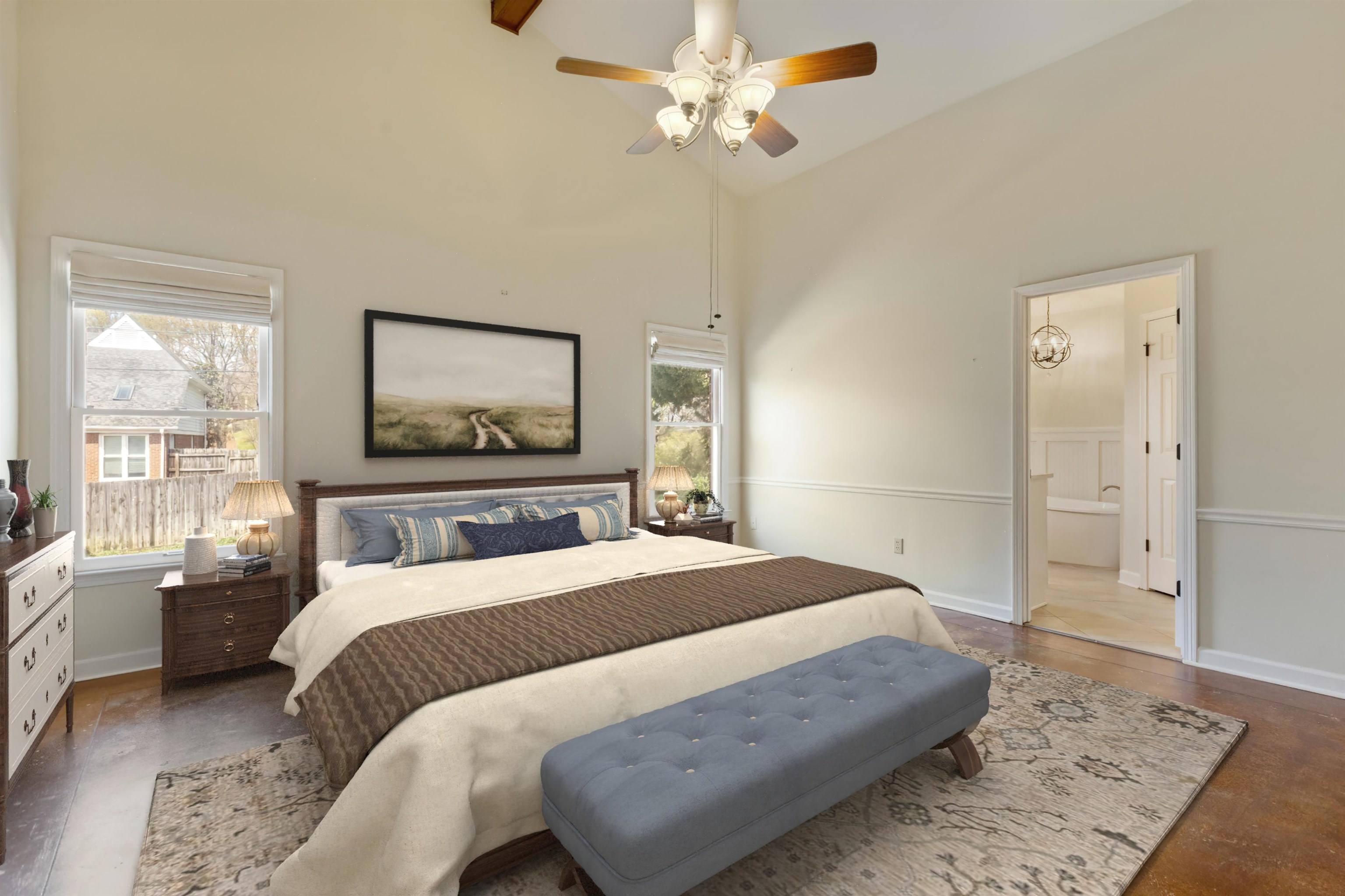 7792 Fawn Ridge Cove Memphis, TN 38016 - Photo 13 of 26 Bedroom with high vaulted ceiling, ensuite bath, multiple windows, and baseboards