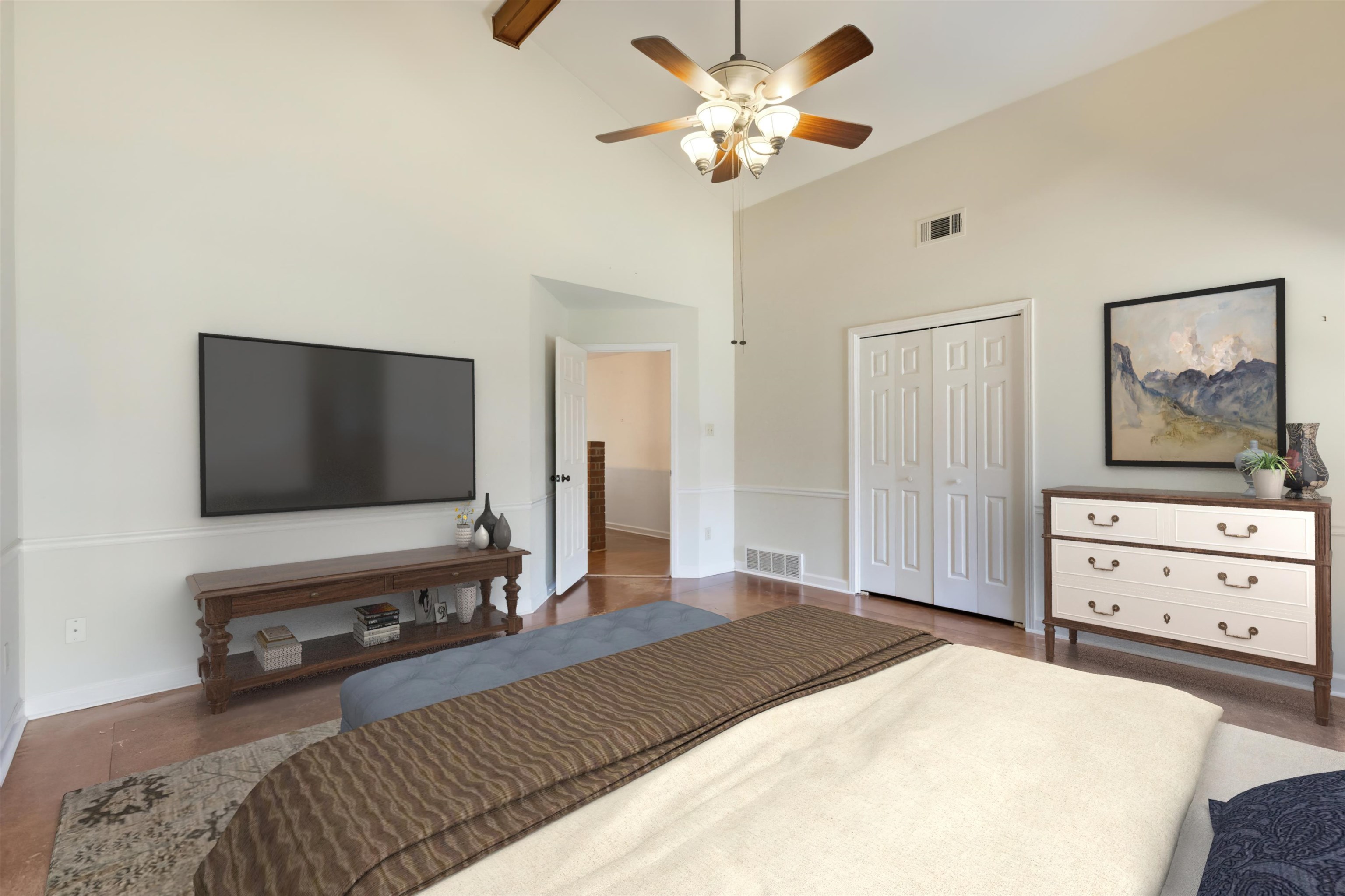 7792 Fawn Ridge Cove Memphis, TN 38016 - Photo 14 of 26 Bedroom featuring visible vents, high vaulted ceiling, a closet, and beamed ceiling