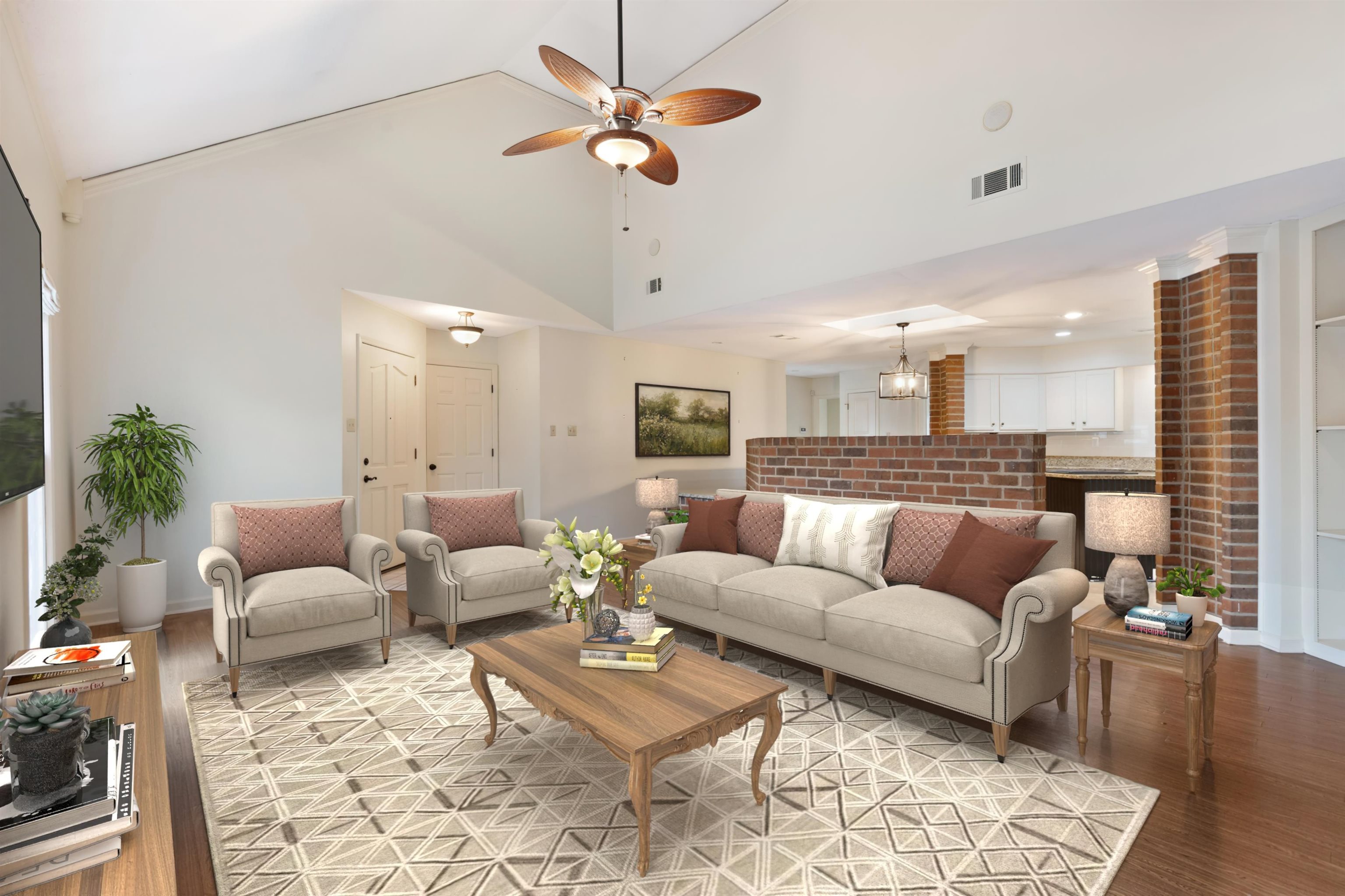 7792 Fawn Ridge Cove Memphis, TN 38016 - Photo 5 of 26 Living room with high vaulted ceiling, a ceiling fan, visible vents, light wood finished floors, and baseboards