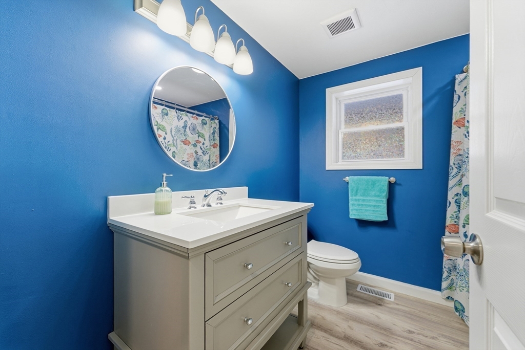 160 Cottage Street Athol, MA 01331 - Photo 12 of 35 a bathroom with a toilet a sink and mirror