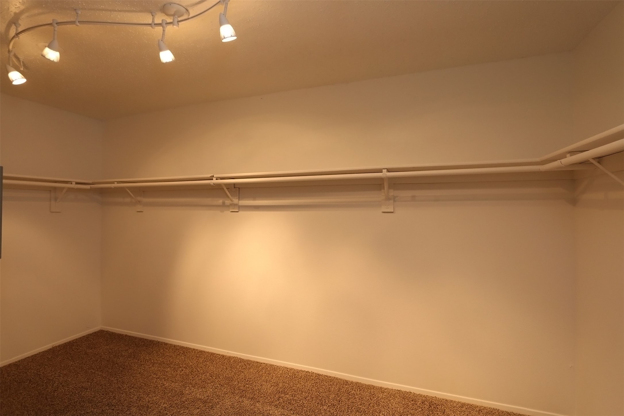 6430 Kentwick Drive Houston, TX 77084 - Photo 21 of 26 a view of a room with racks on the wall