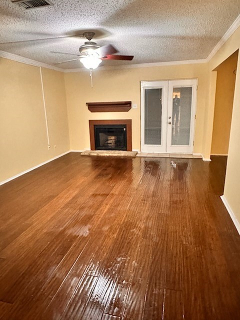 6430 Kentwick Drive Houston, TX 77084 - Photo 8 of 26 a view of an empty room with wooden floor and a window