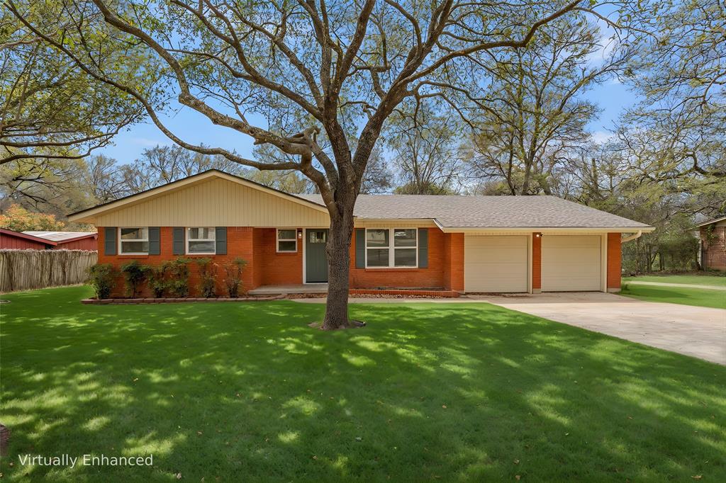 2512 Stewart Drive Waco, TX 76708 - Photo 1 of 1 a front view of a house with yard