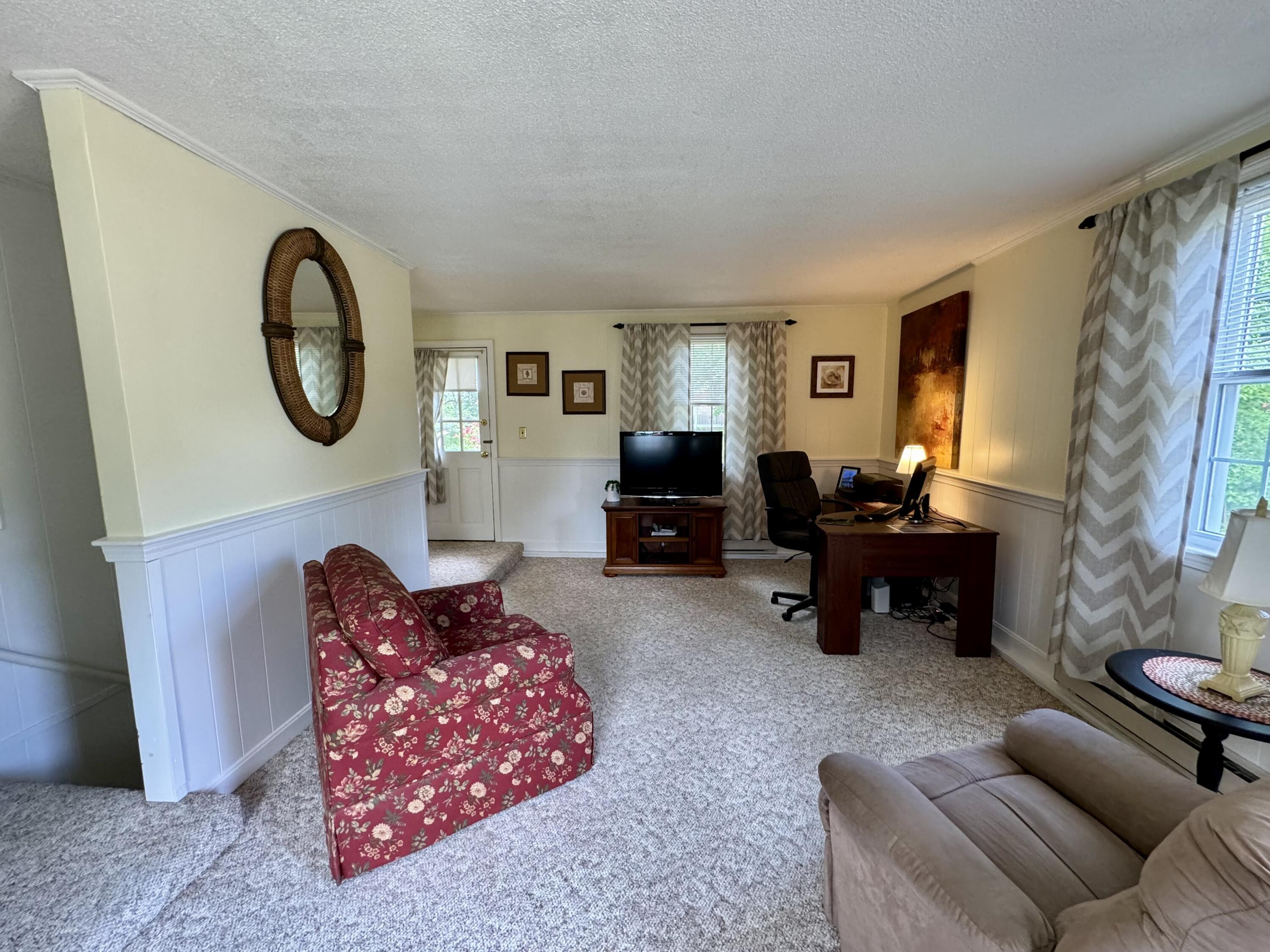 173 Nottingham Drive Centerville, MA 02632 - Photo 22 of 54 a living room with furniture a couch and a window