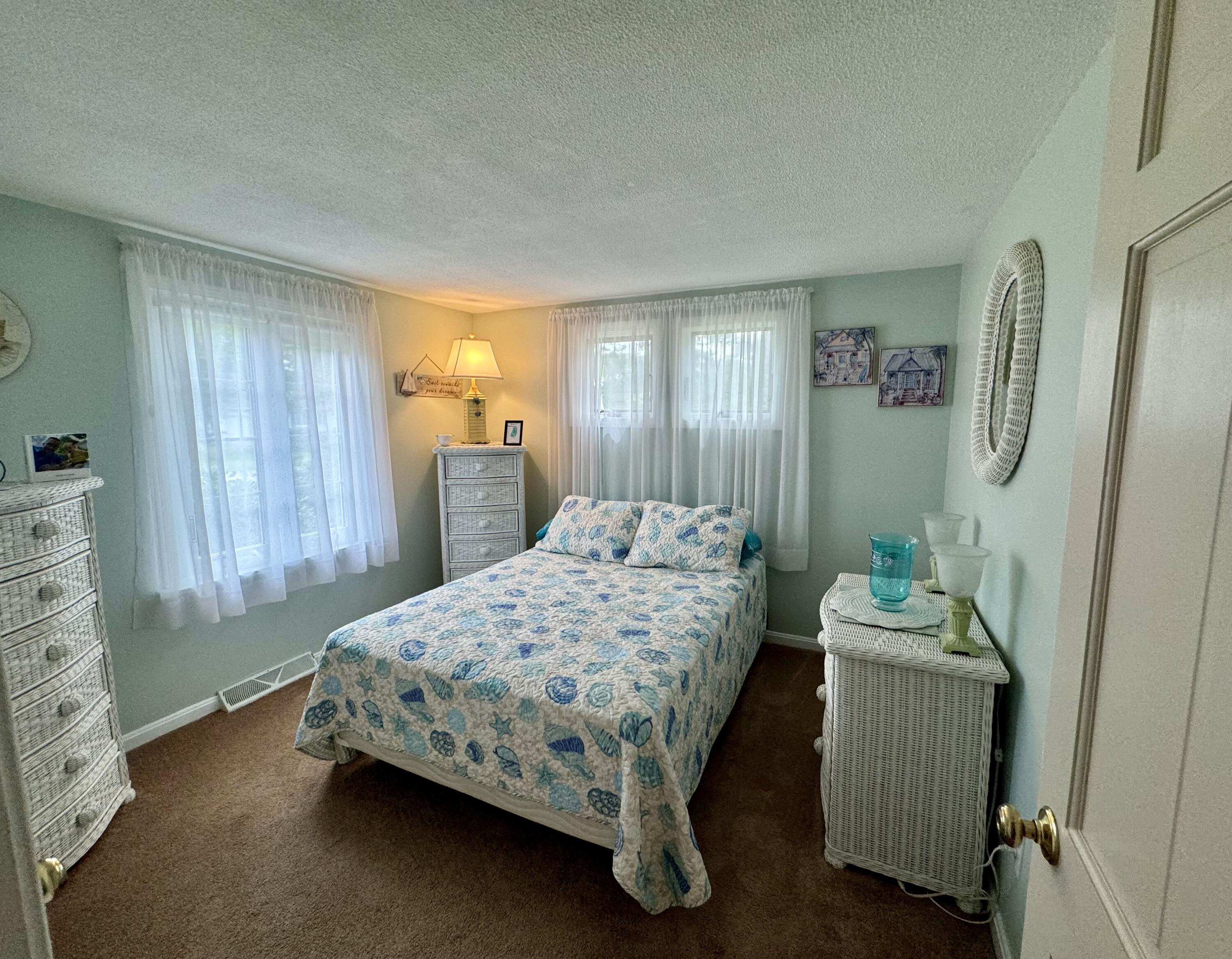 173 Nottingham Drive Centerville, MA 02632 - Photo 31 of 54 a bedroom with a bed and a window