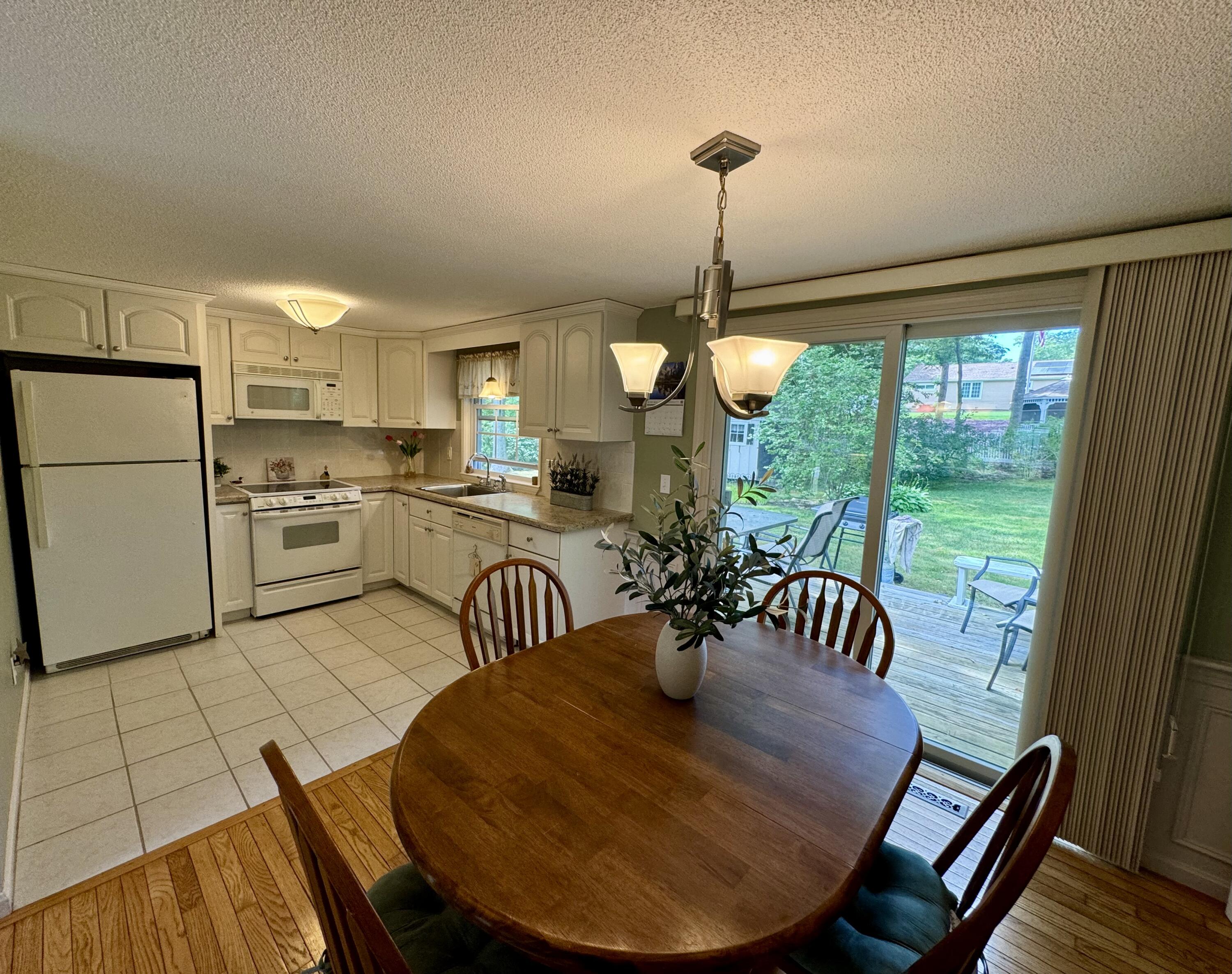 173 Nottingham Drive Centerville, MA 02632 - Photo 10 of 54 kitchen.dining area.slider to deck