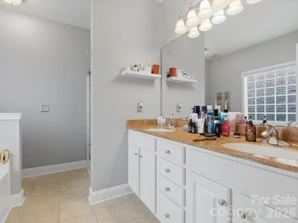 a kitchen with cabinets a sink and dishwasher