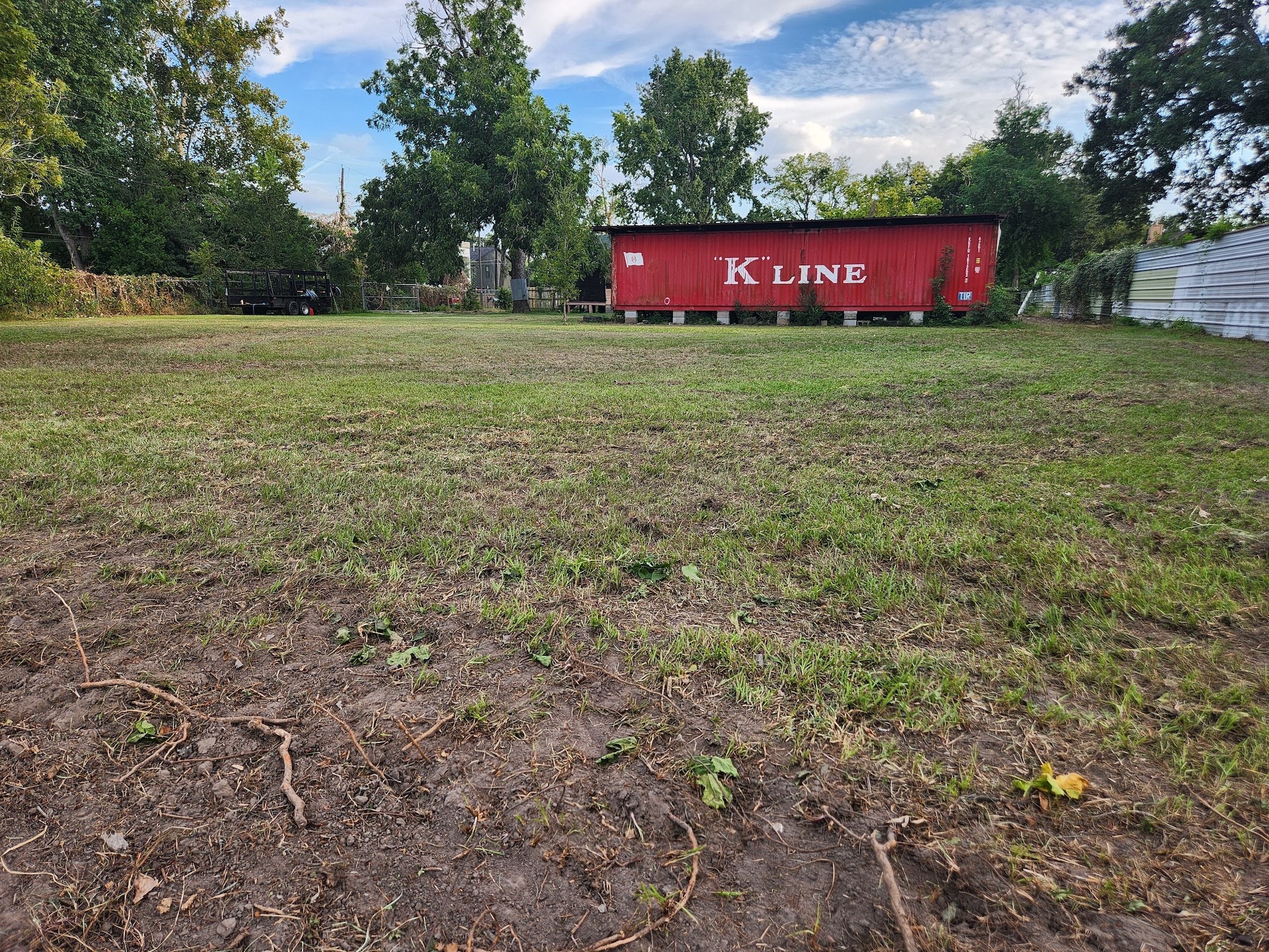 a view of a yard with an outdoor space