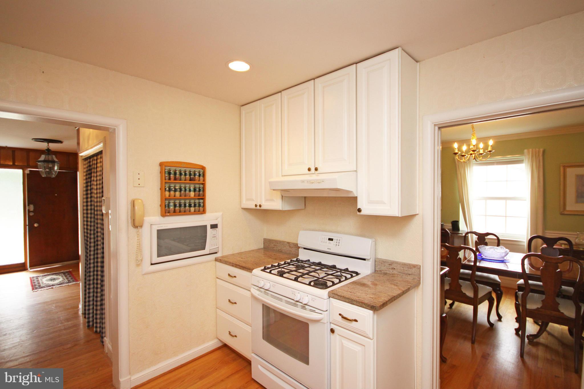 9706 Saxony Road Silver Spring, MD 20910 - Photo 3 of 30 Kitchen with view back to Foyer/front door
