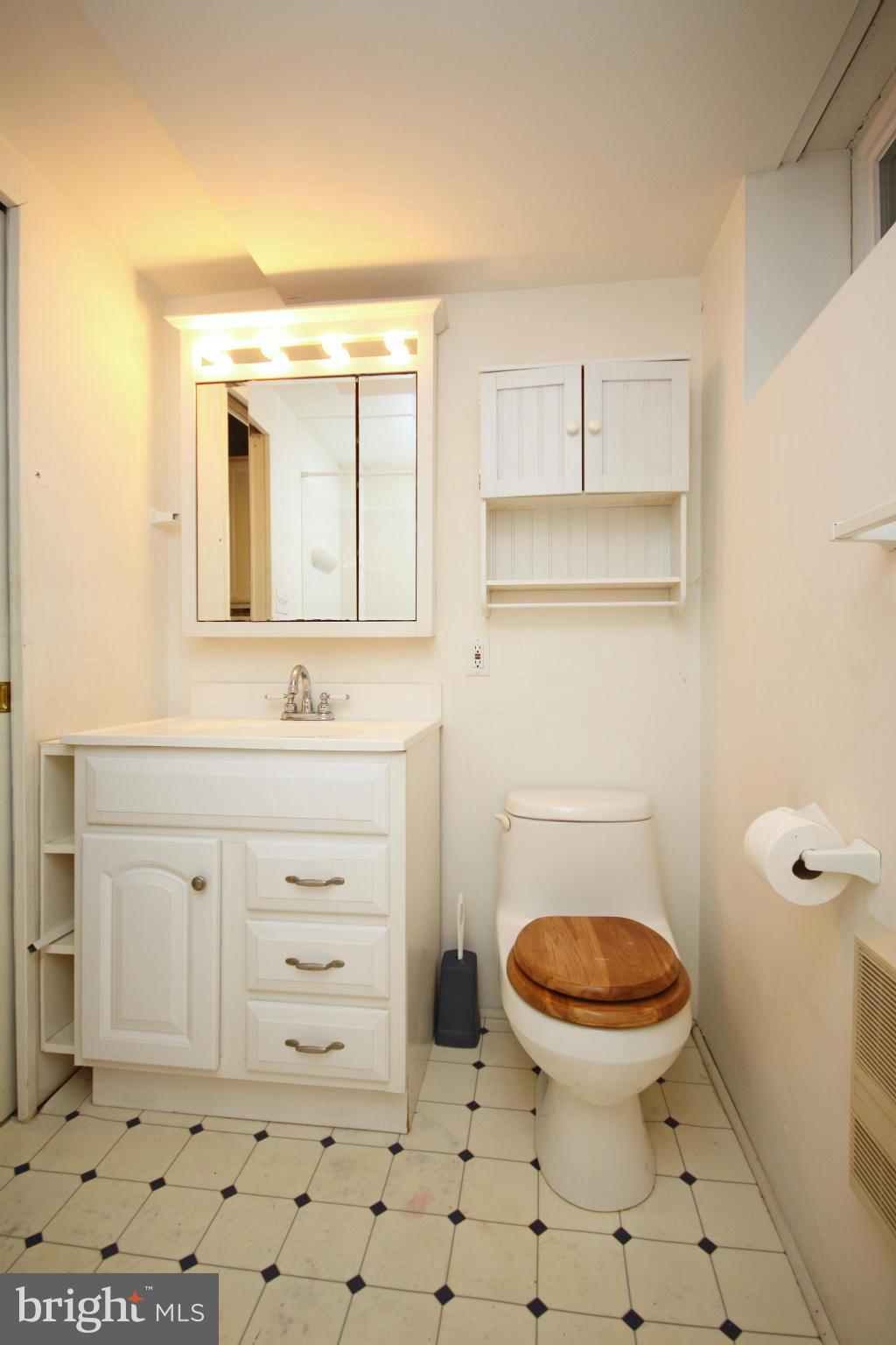 9706 Saxony Road Silver Spring, MD 20910 - Photo 22 of 30 Bath with Tub and surround, hall access@ Family Rm