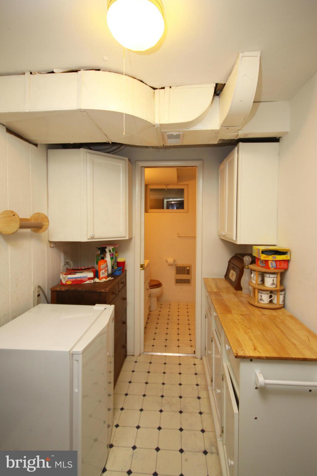 9706 Saxony Road Silver Spring, MD 20910 - Photo 23 of 30 Partial Kitchenette in hall of finished area