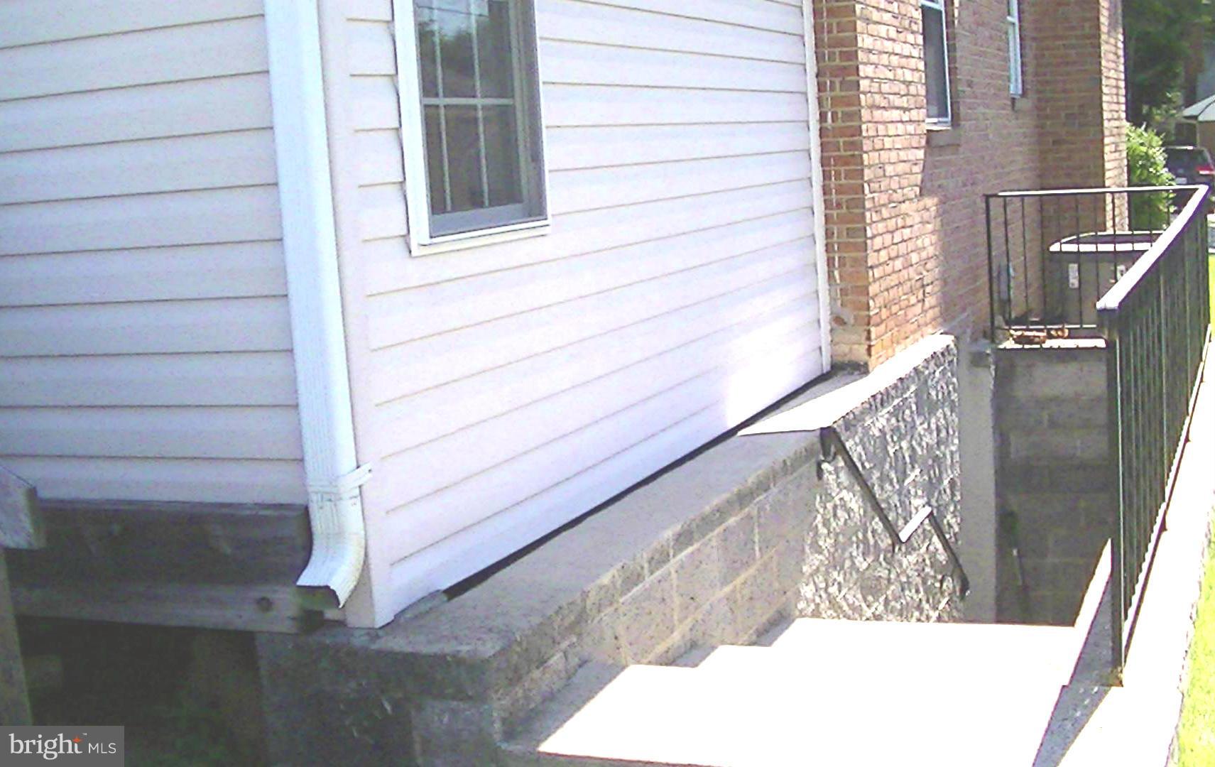 9706 Saxony Road Silver Spring, MD 20910 - Photo 27 of 30 Over size exterior stairway to basement