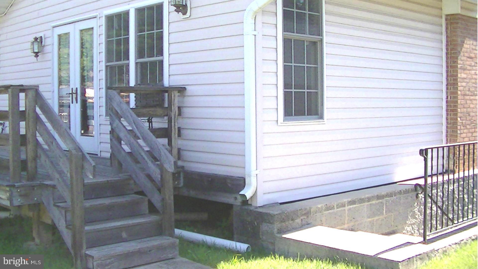 9706 Saxony Road Silver Spring, MD 20910 - Photo 28 of 30 Exterior View of entry to family room and basement