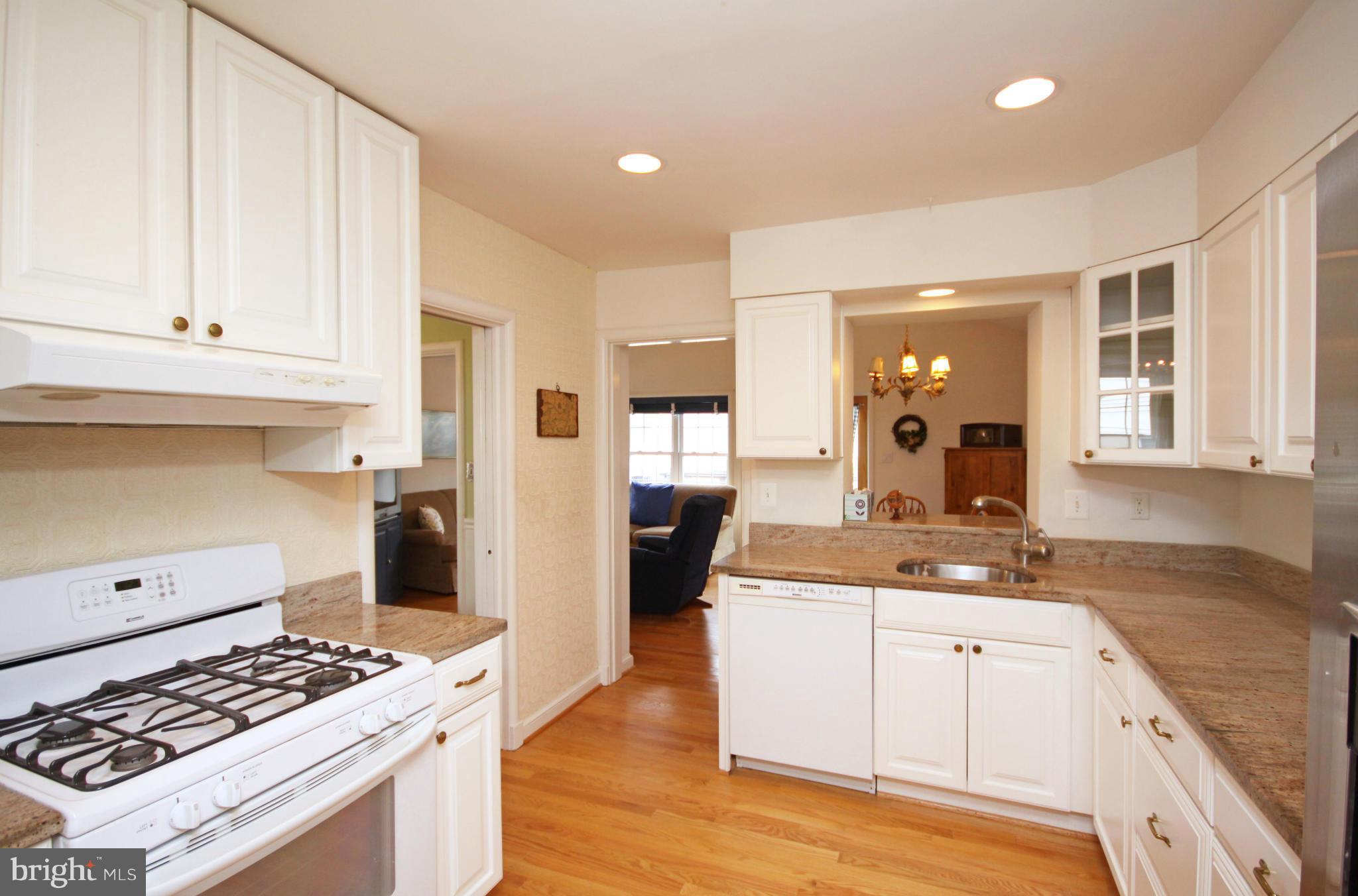 9706 Saxony Road Silver Spring, MD 20910 - Photo 5 of 30 Kitchen, view to Family Room to rear deck