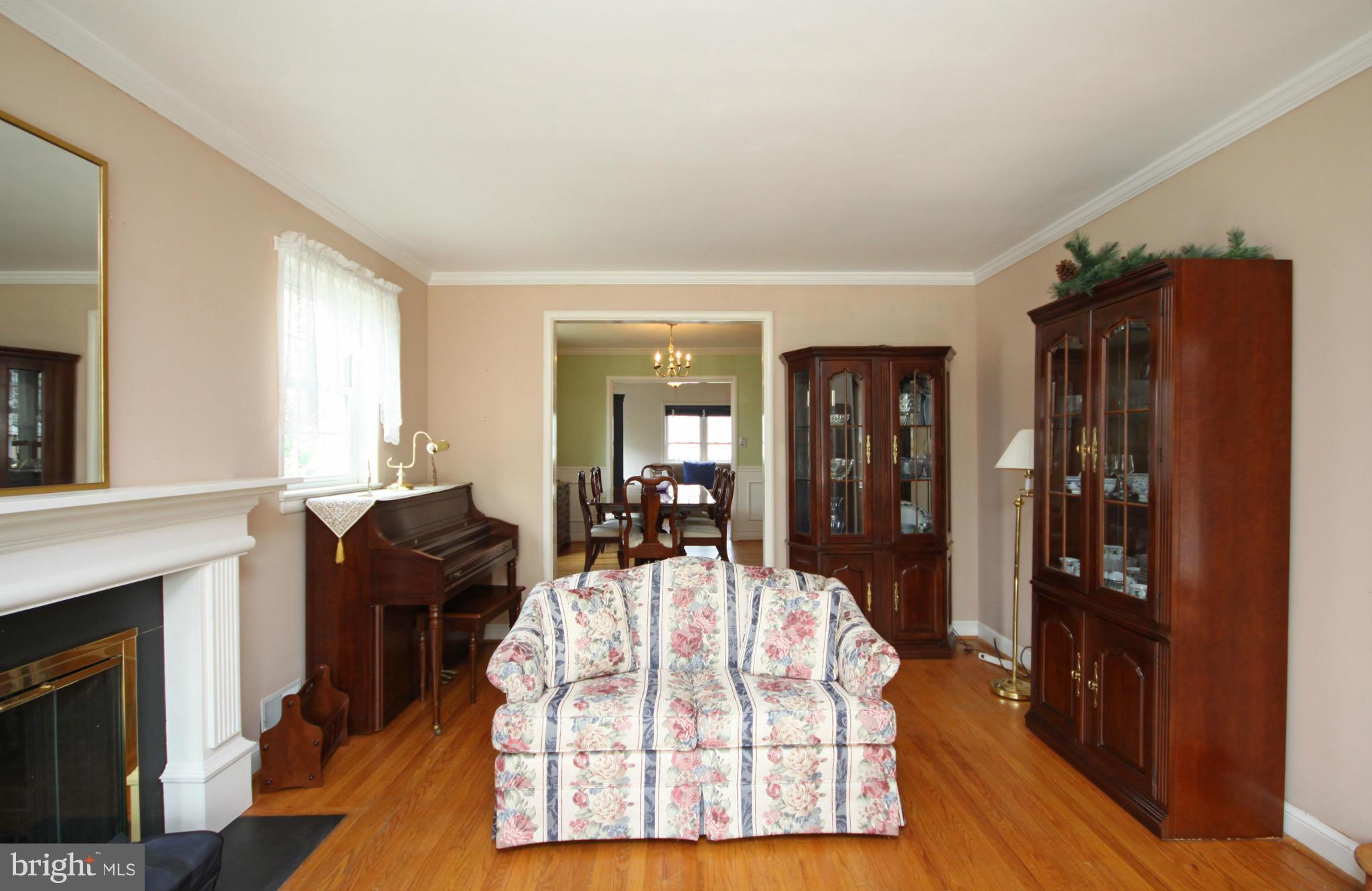 9706 Saxony Road Silver Spring, MD 20910 - Photo 9 of 30 Sunken Living Room with Fireplace(as-is)
