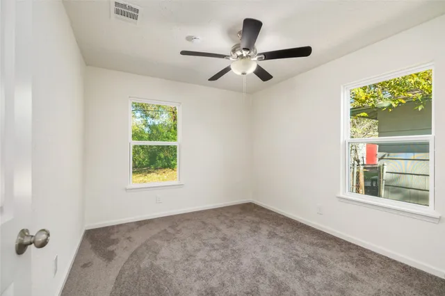 a white bath tub sitting next to a white sink