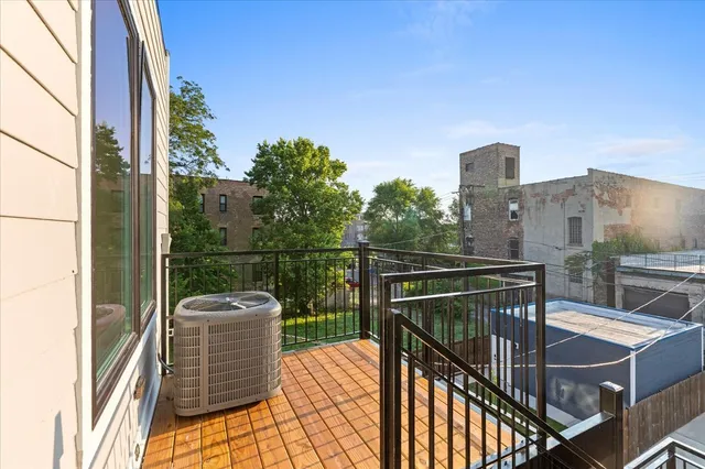 a balcony with view of city view