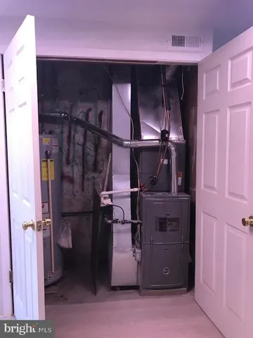 a bathroom with a toilet and a sink