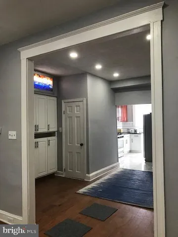 a kitchen with granite countertop stainless steel appliances and cabinets