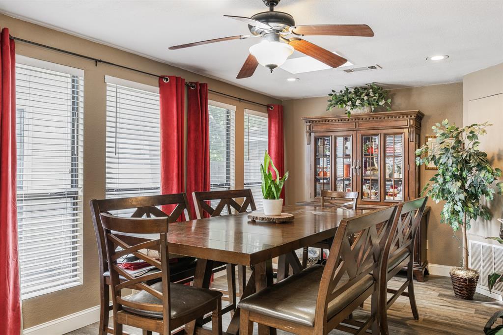2877 Fenwick Street Grand Prairie, TX 75052 - Photo 12 of 27 a view of a dining room with furniture window and outside view