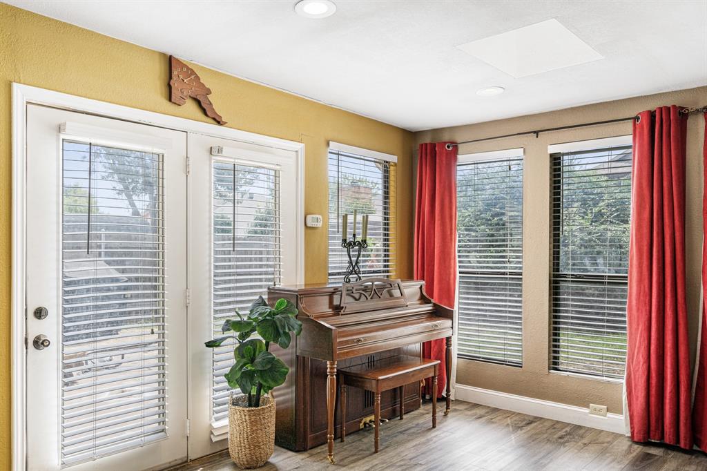 2877 Fenwick Street Grand Prairie, TX 75052 - Photo 14 of 27 a room with furniture and a window