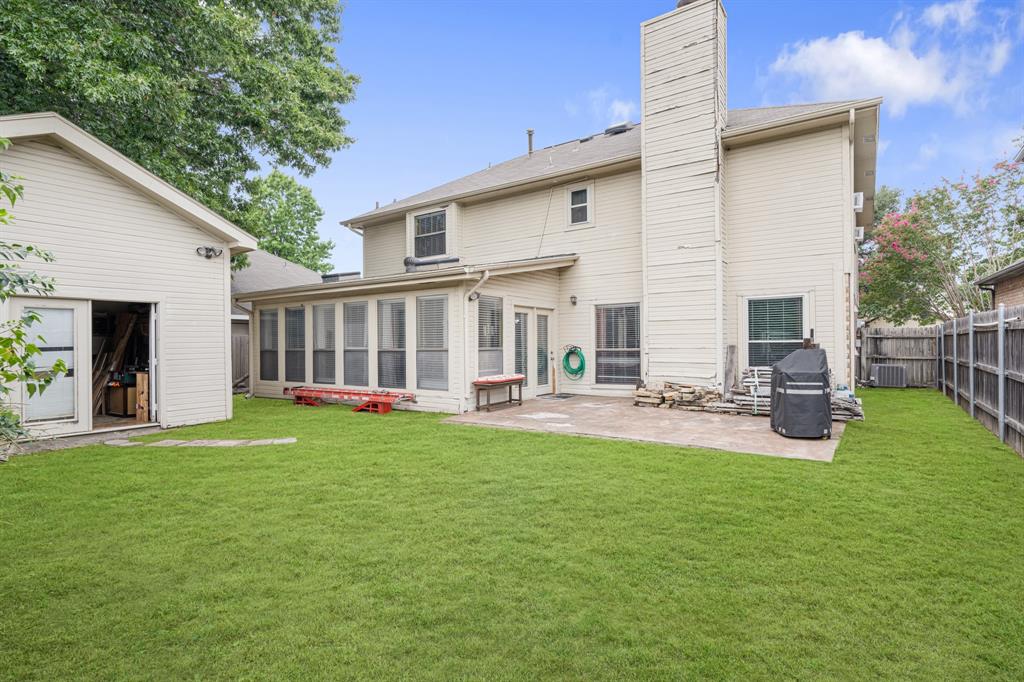 2877 Fenwick Street Grand Prairie, TX 75052 - Photo 25 of 27 a view of a house with backyard and sitting area
