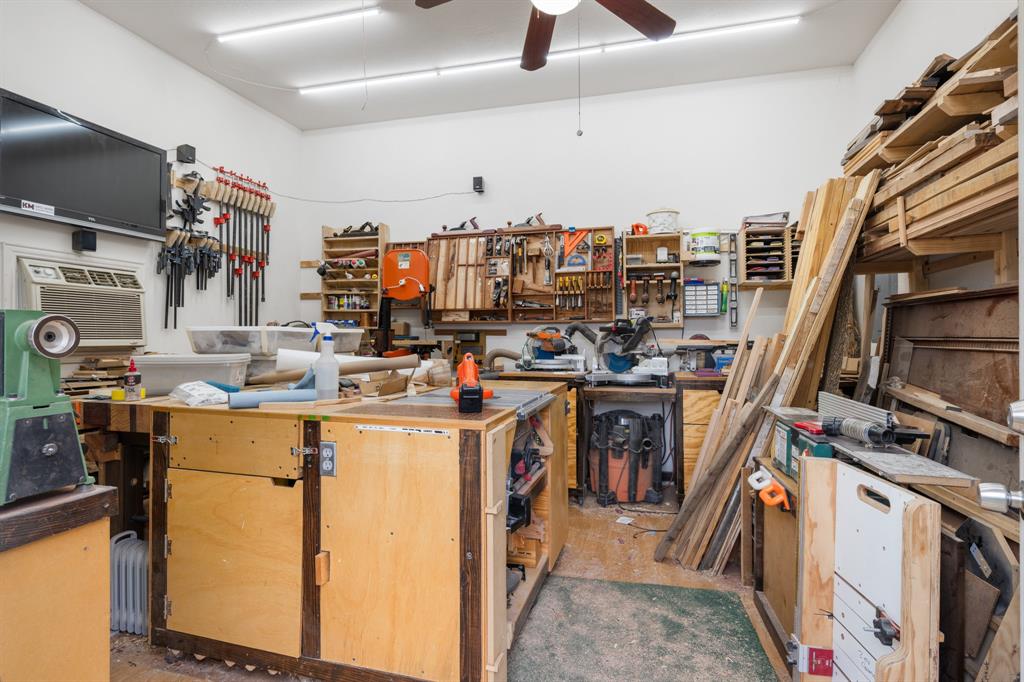 2877 Fenwick Street Grand Prairie, TX 75052 - Photo 27 of 27 a storage room with washer and dryer