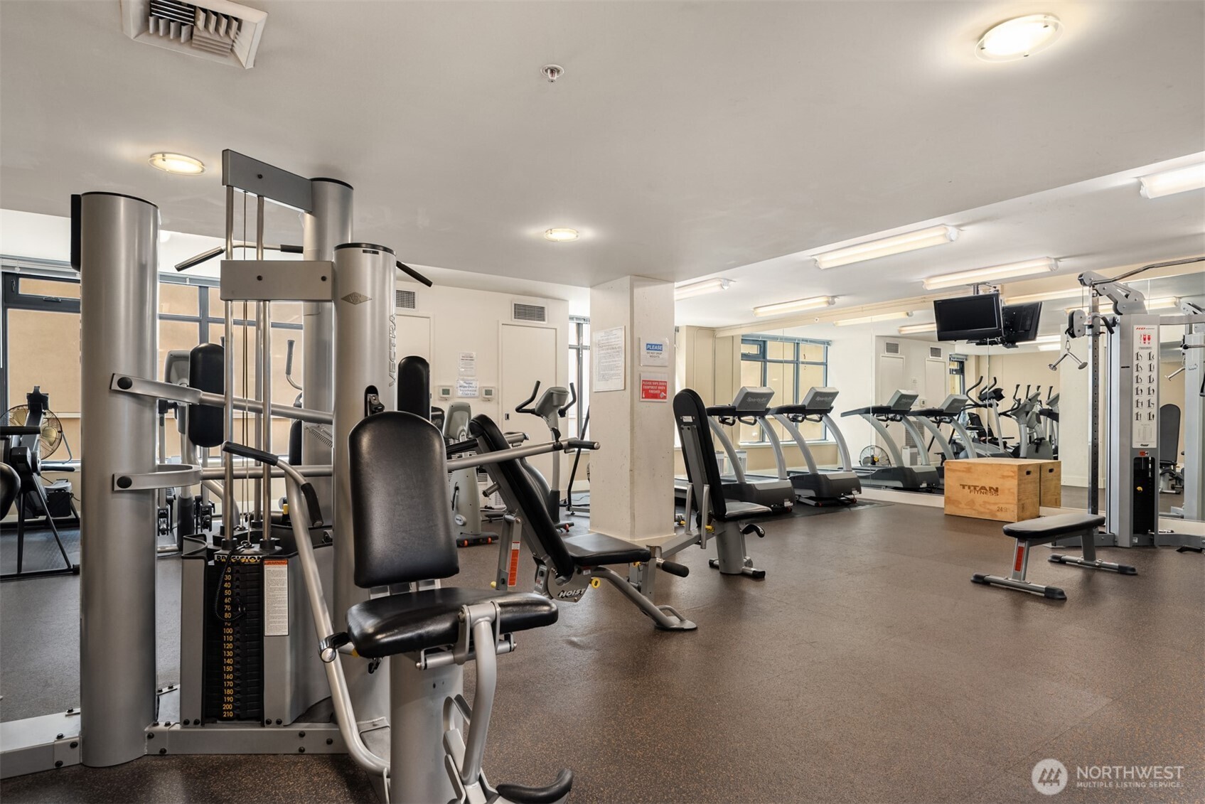 2911 2nd Avenue, Unit 310 Seattle, WA 98121 - Photo 26 of 40 a view of a room with gym equipment