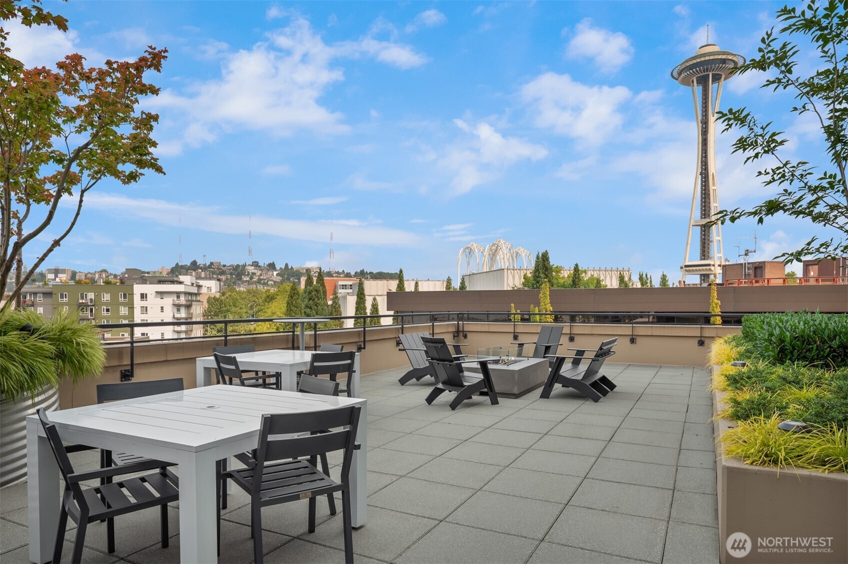 2911 2nd Avenue, Unit 310 Seattle, WA 98121 - Photo 31 of 40 a view of city from terrace with seating space