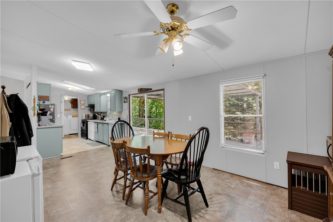 162 Newberry Road Walhalla, SC 29691 - Photo 10 of 50 An inviting eat-in kitchen with durable tile flooring and ample space for gatherings.