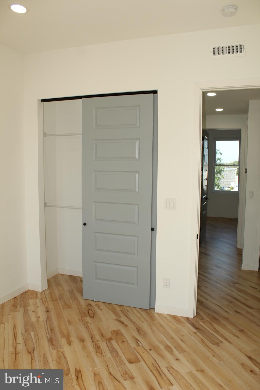 3017 Ridge Avenue, Unit B Philadelphia, PA 19121 - Photo 14 of 29 Modern closet with sleek sliding door.