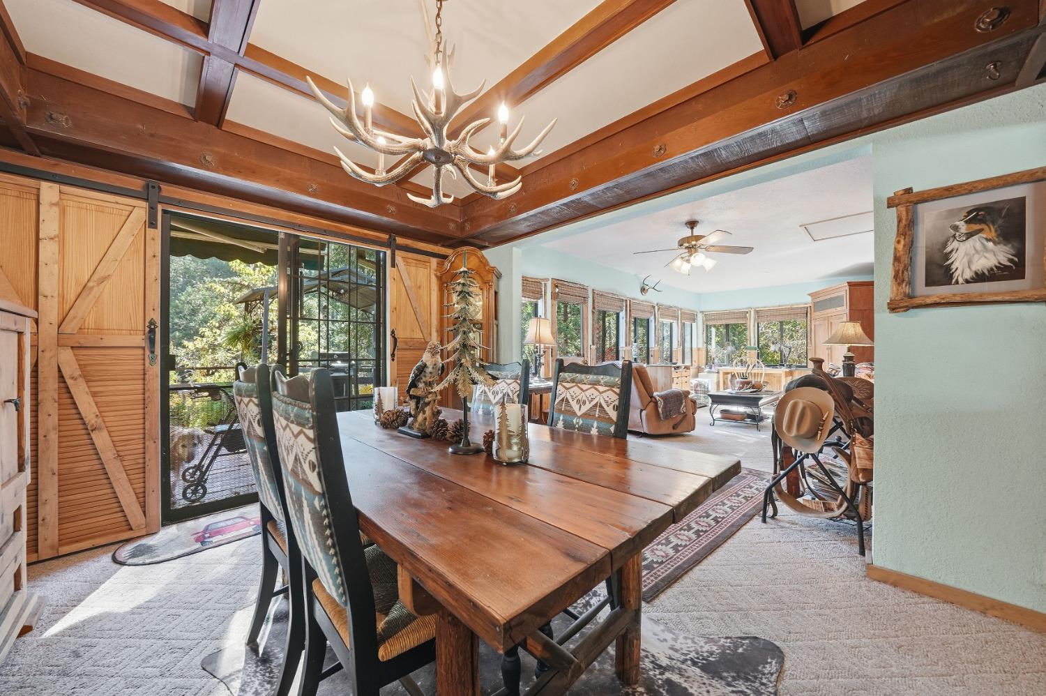 23140 Shake Ridge Road Volcano, CA 95689 - Photo 18 of 81 a view of a dining room with furniture window and outside view