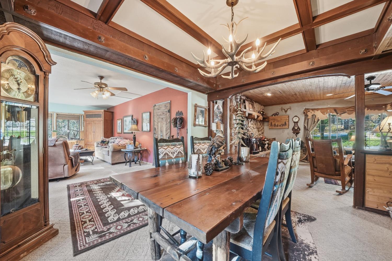 23140 Shake Ridge Road Volcano, CA 95689 - Photo 19 of 81 a view of a dining room with furniture window and outside view