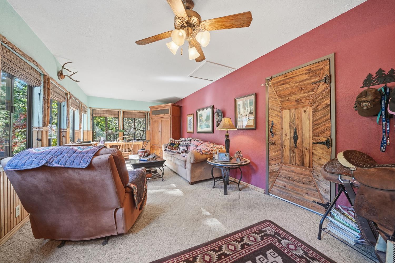 23140 Shake Ridge Road Volcano, CA 95689 - Photo 23 of 81 a living room with furniture rug and window