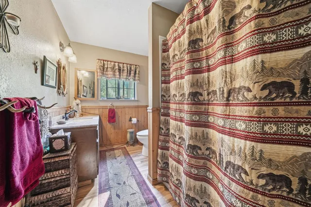 a room with furniture and a flat screen tv