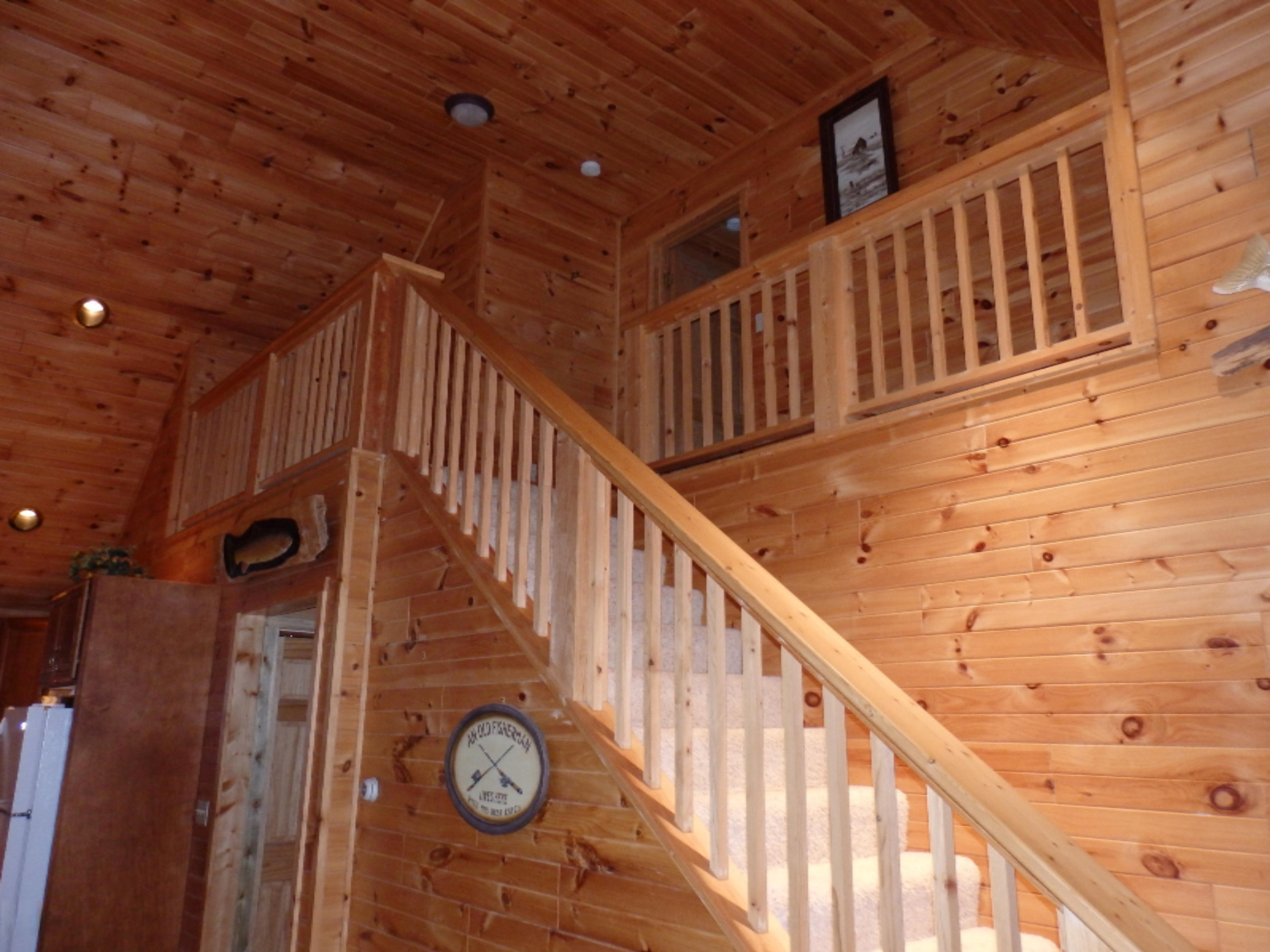 12600 Milks Road Kaleva, MI 49645 - Photo 29 of 65 stairway to loft and master