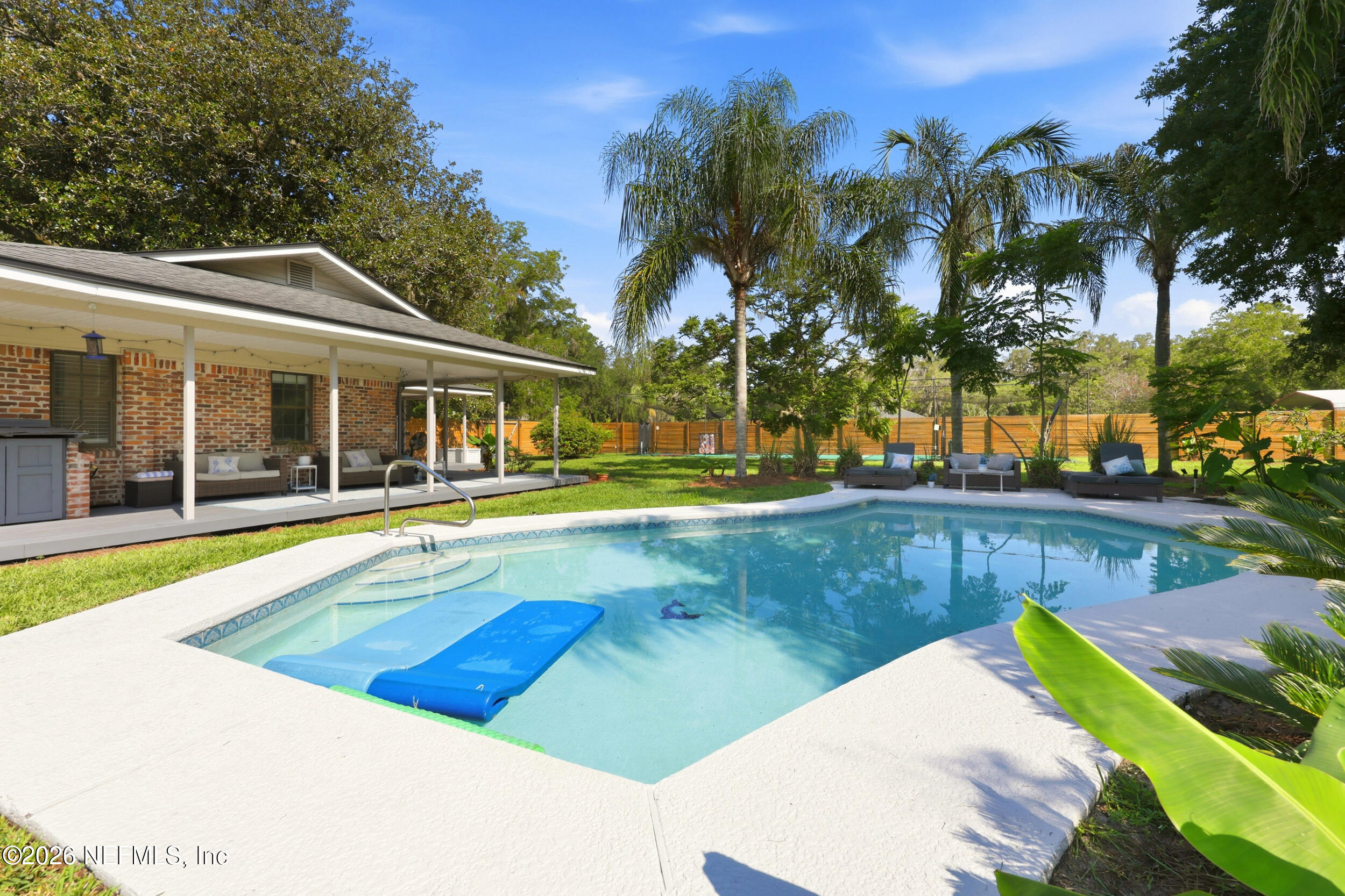 11627 Mandarin Terrace Road Jacksonville, FL 32223 - Photo 6 of 79 a view of an house with swimming pool and yard