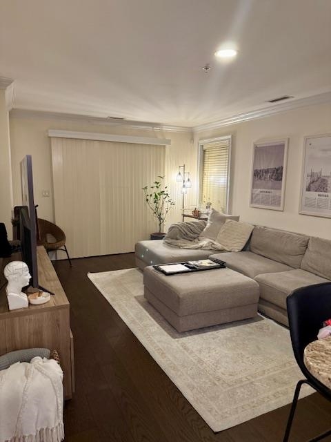 1625 Paterson Plank Road, Unit 1 Secaucus, NJ 07094 - Photo 3 of 19 a living room with furniture and wooden floor