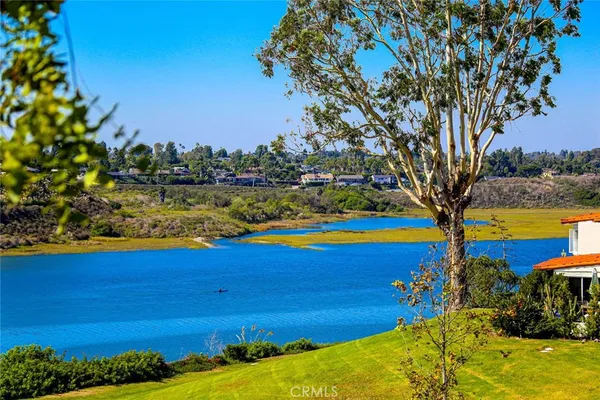 a view of swimming pool with an ocean view