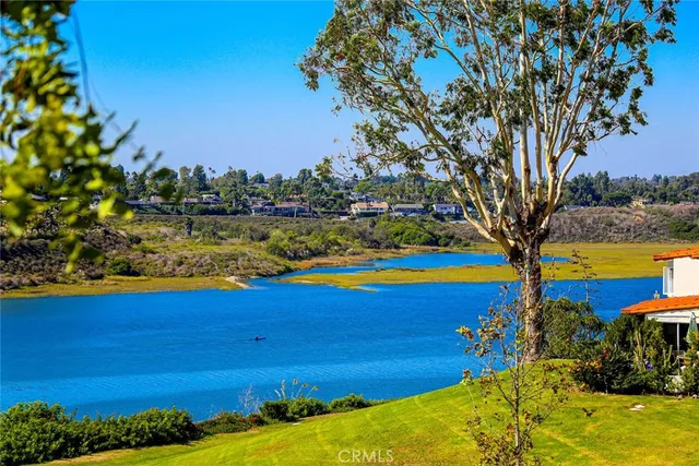 a view of swimming pool with an ocean view