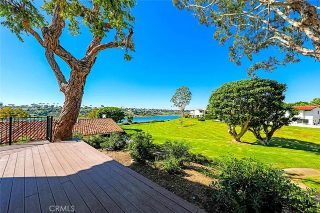 a view of swimming pool from a balcony