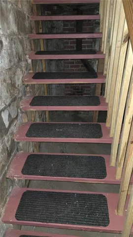 a room with wooden cabinets and a wooden floor