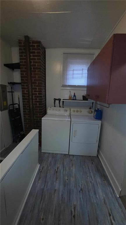 105 19th Street Pittsburgh, PA 15215 - Photo 17 of 40 a room with wooden cabinets and a wooden floor