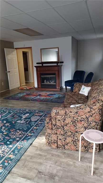 105 19th Street Pittsburgh, PA 15215 - Photo 25 of 40 a bedroom with a bed and a fireplace