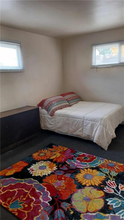 105 19th Street Pittsburgh, PA 15215 - Photo 31 of 40 a bedroom with a bed and a painting on the wall