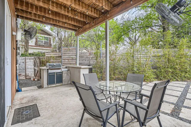 a outdoor view with sitting space and trees