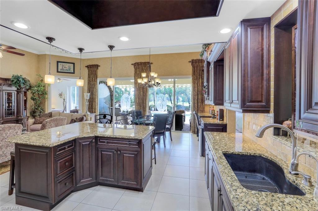 5156 Inagua Way Naples, FL 34119 - Photo 8 of 35 Enjoy Panoramic Views of your home and the Pool area while chatting with Guests