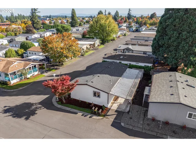 an aerial view of a house with a garden